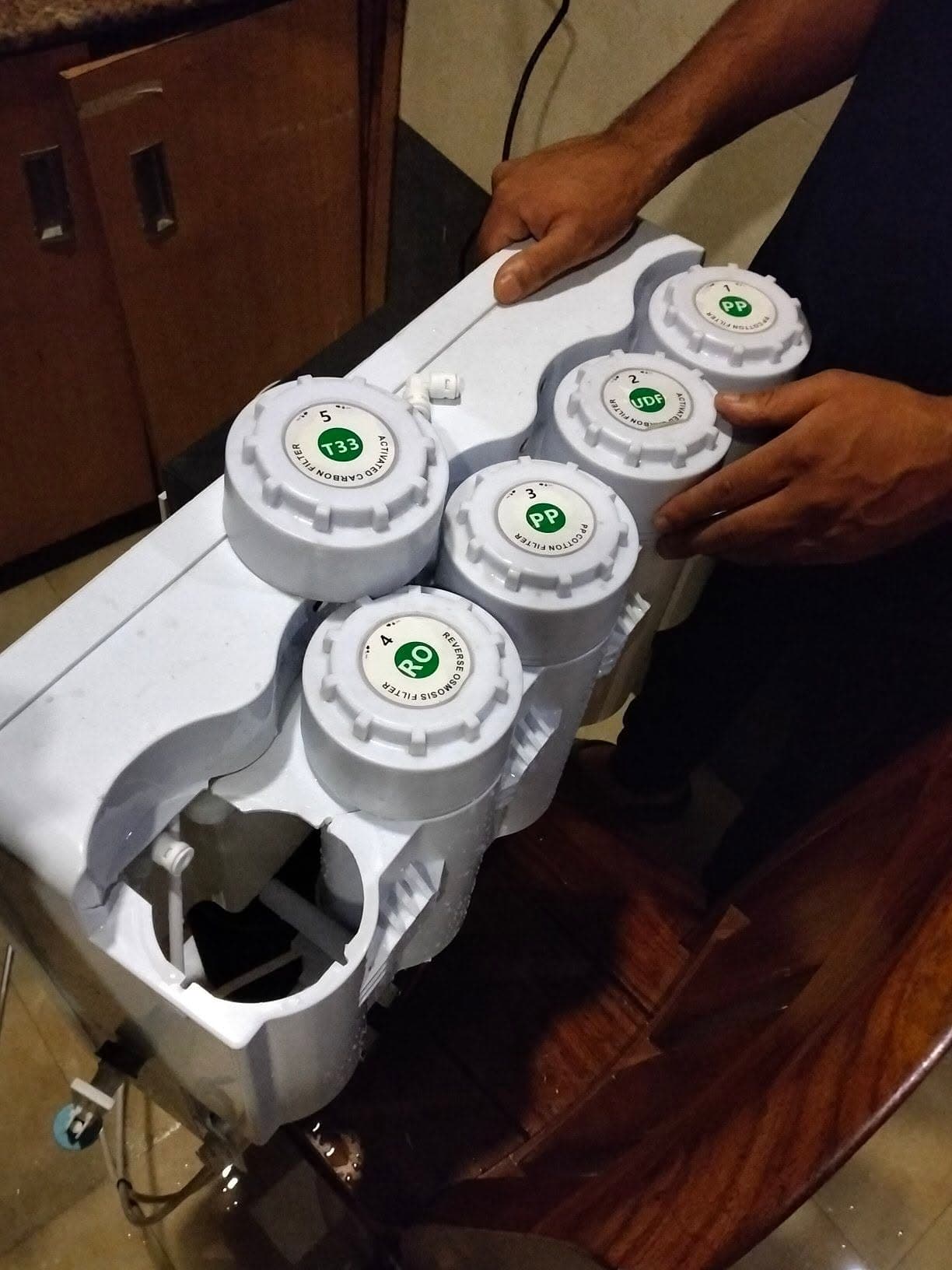 Five-stage RO filter cartridges replaced during service