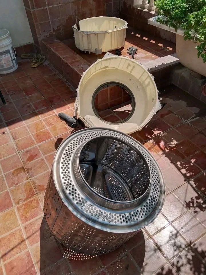 Washing machine drum and tub disassembled for cleaning and service