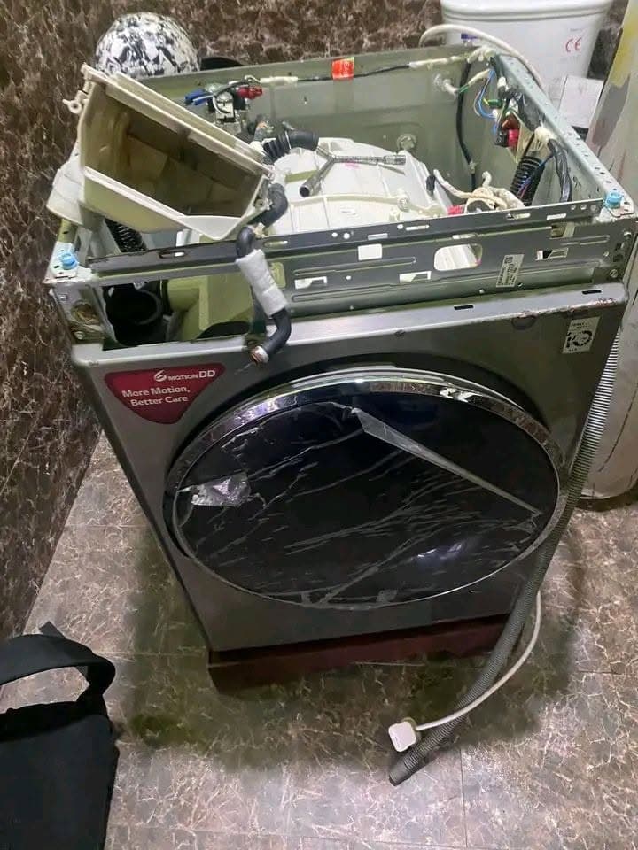 LG front-load washing machine opened up for repair