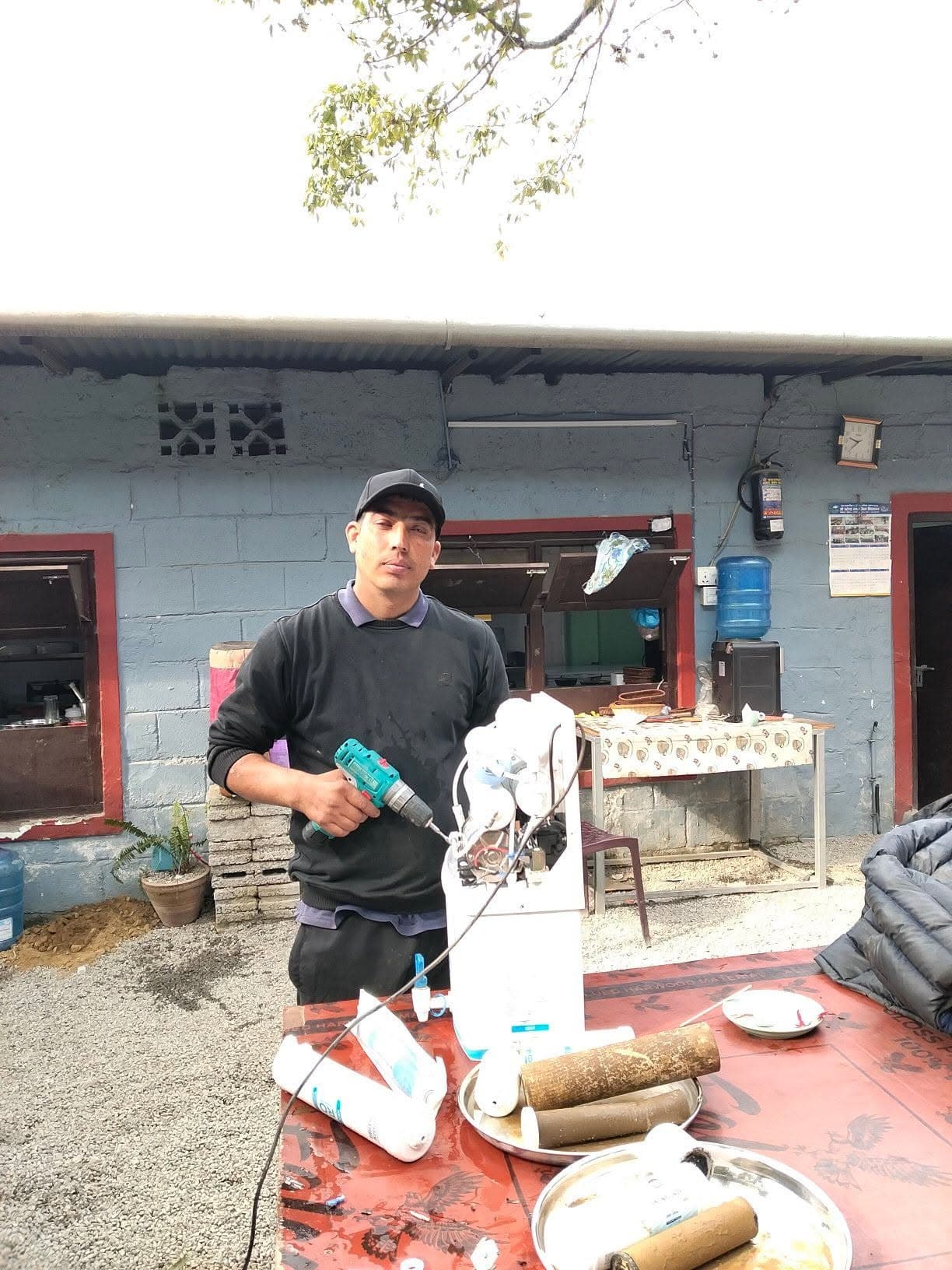 Technician servicing an RO water purifier